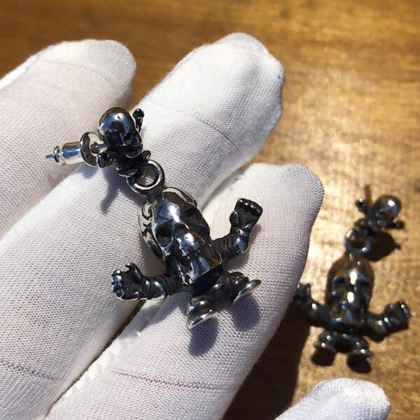 Chrome Hearst double skull villain Foti earrings